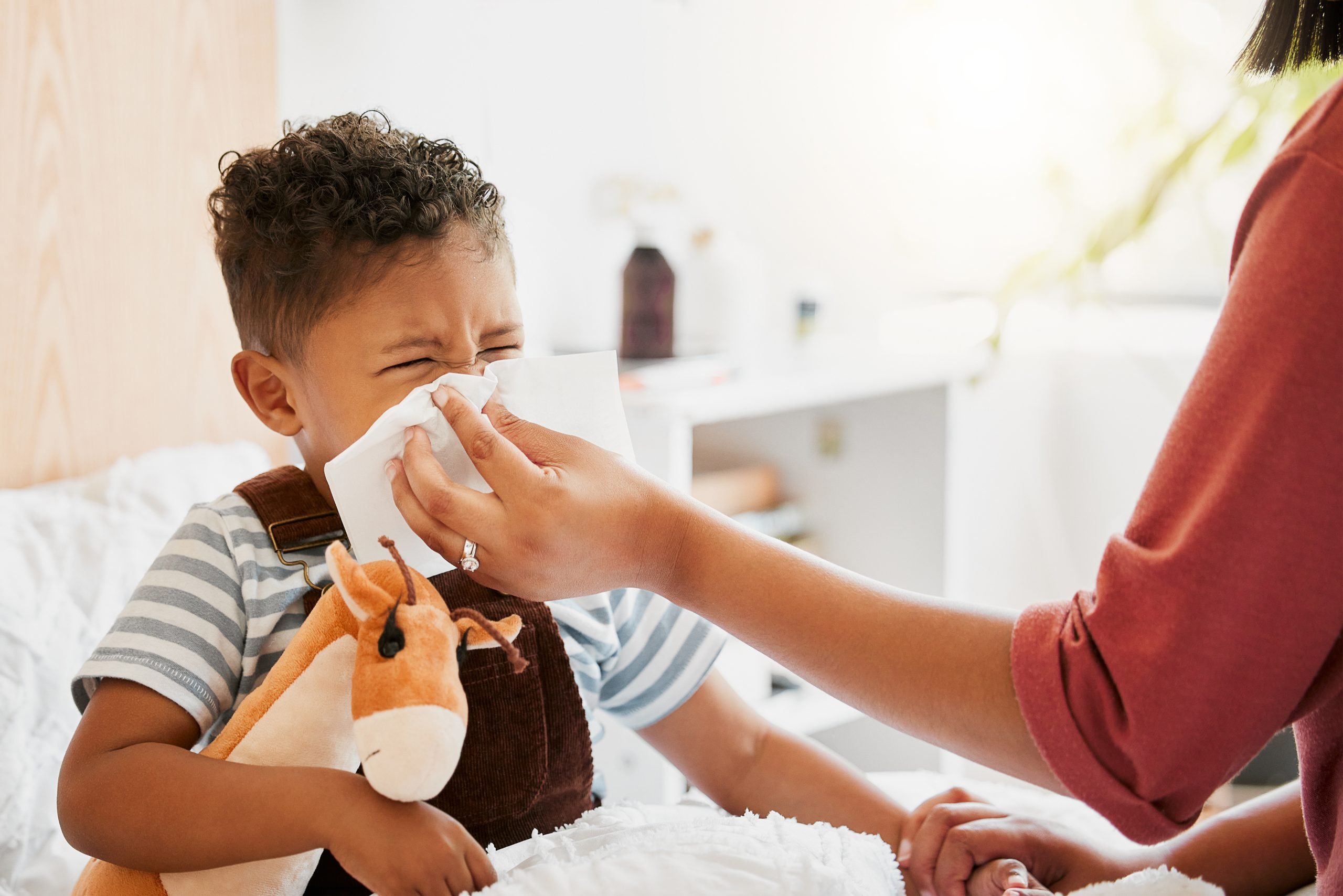 flu-sick-or-cold-child-with-parent-sneezing-blow-2025-04-06-08-12-14-utc